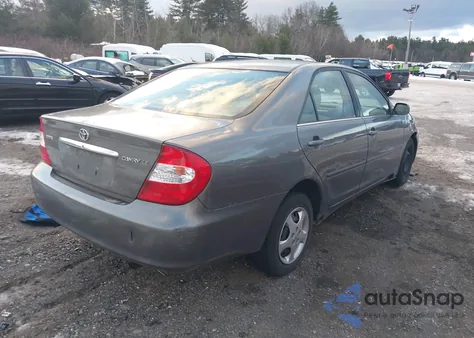 2003 Toyota Camry Le z USA, uszkodzony, nr VIN 4T1BE32K13U682017